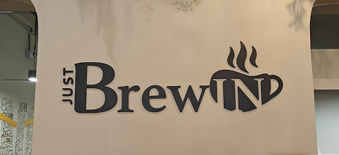 Office signage with logo branding displayed at business entrance